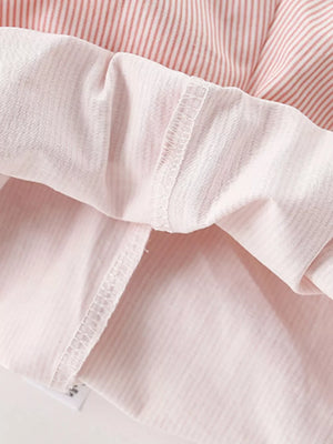 Toddler cotton bubble shorts with pink and white stripes and white trim.