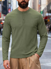 Men's long sleeve cotton Henley t-shirt in Bean Green with button placket and crew neck.