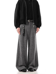 Gray ribbed wide-leg sweatpants with a tassel keychain accessory.