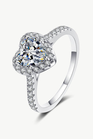 Silver ring with heart-cut diamond and halo of smaller diamonds