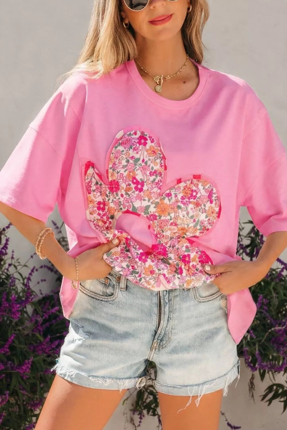 Pink cotton tunic t-shirt with floral cactus patch detail and short sleeves.