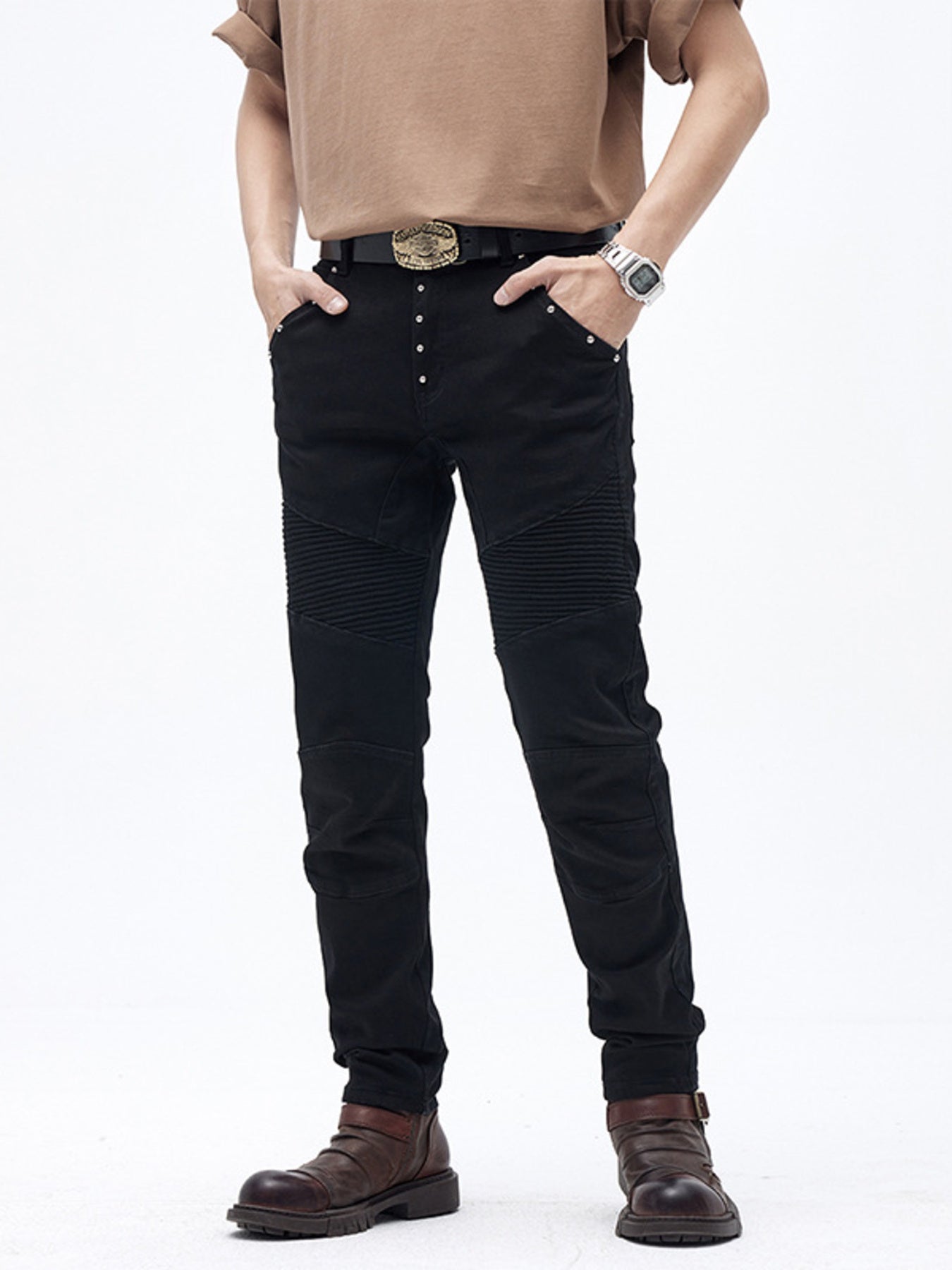 Black cotton slim fit moto jeans with ribbed panels and button fly.