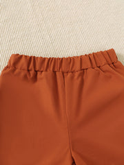 Burnt orange baby shorts with elastic waistband