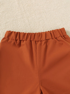 Burnt orange baby shorts with elastic waistband