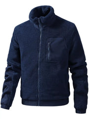 Dark blue sherpa fleece zip-up jacket with mock neck and chest pocket detail.
