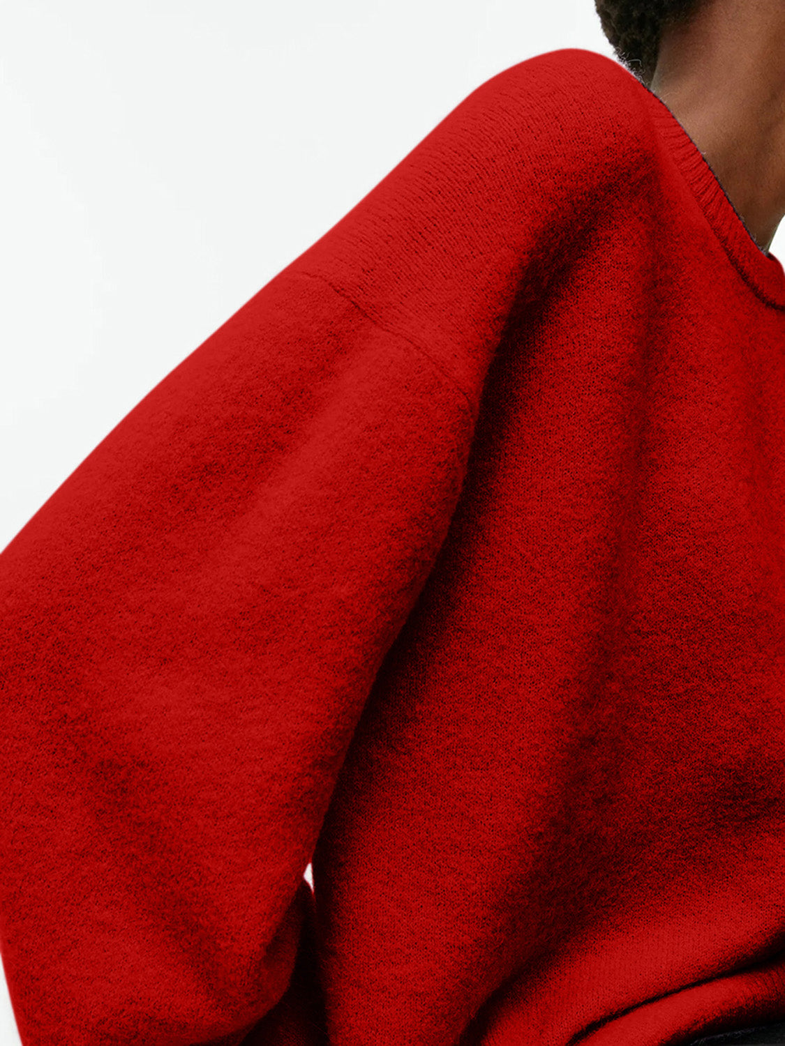 Oversized brushed knit crewneck sweater in Deep Red with a soft texture.