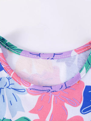 Baby dress with playful bow print, round neckline, and colorful trim.