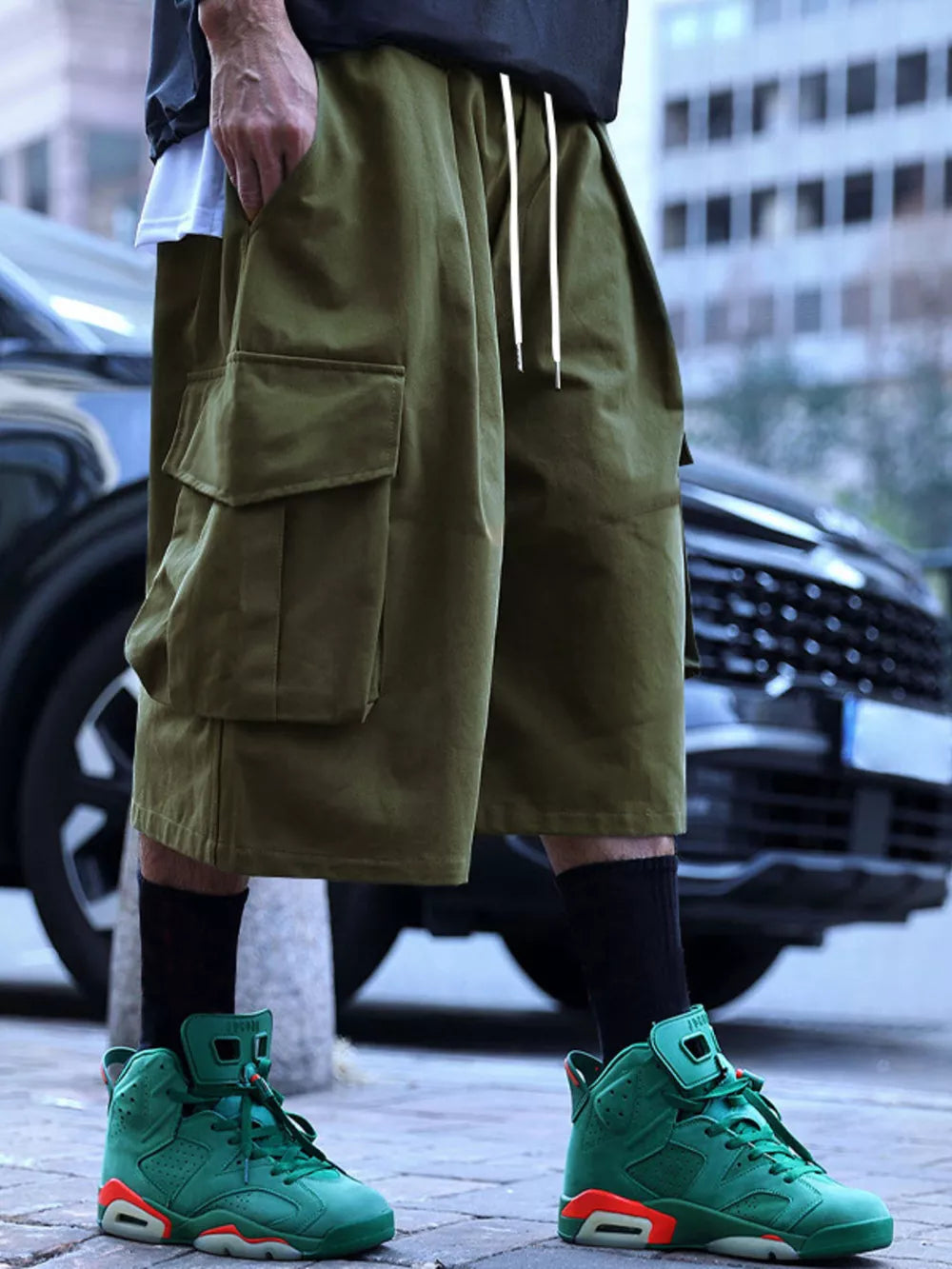 Men's Full Size Cargo Shorts With Drawstring Waist in Khakis, model styling view