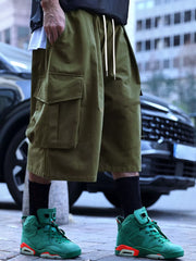 Men's Full Size Cargo Shorts With Drawstring Waist in Khakis, model styling view
