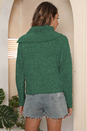 Dark Green textured knit sweater with asymmetric collar and long sleeves.
