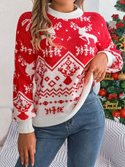 Red acrylic knit sweater with geometric reindeer Fair Isle pattern and white trim.