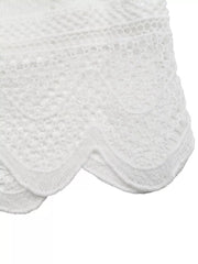 White lace-trimmed maternity shirt with ruffled sleeves and button-up detail.