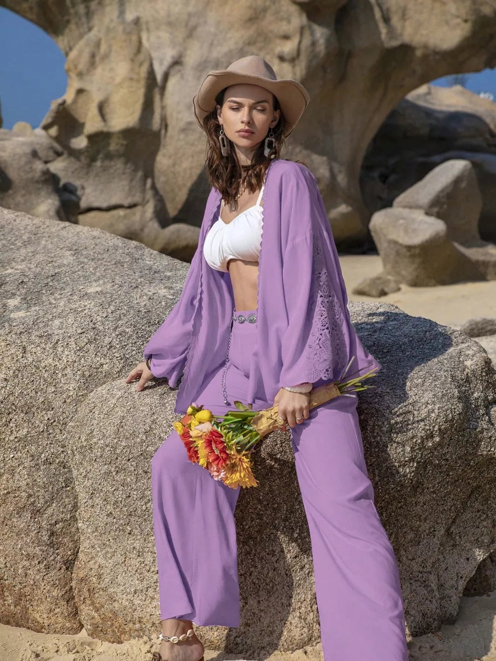 Lavender lace-embellished open front set with wide leg pants and a white scalloped bralette.