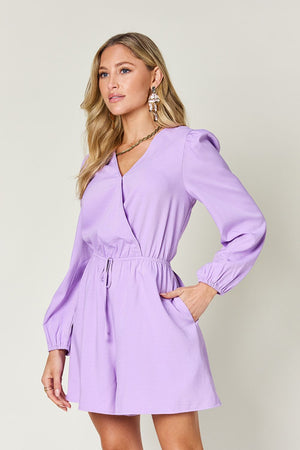 Lavender polyester wrap front romper with puff sleeves and adjustable waist