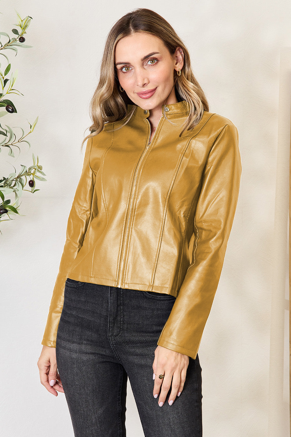 Honey faux leather biker jacket with zip front and stand collar.