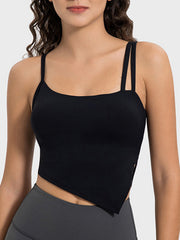 Black asymmetric cutout cami tank top with double spaghetti straps and a square neckline.