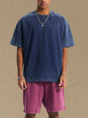 Navy washed cotton t-shirt with round neck and short sleeves.