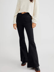 Black flare jeans with a V-shaped waist detail