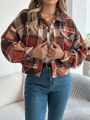 Cropped plaid shacket in terracotta with gathered sleeves and button front.