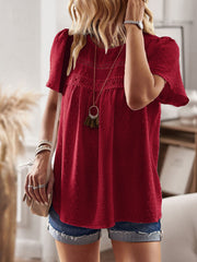 Deep Red textured puff sleeve blouse with lace yoke detail and short sleeves.
