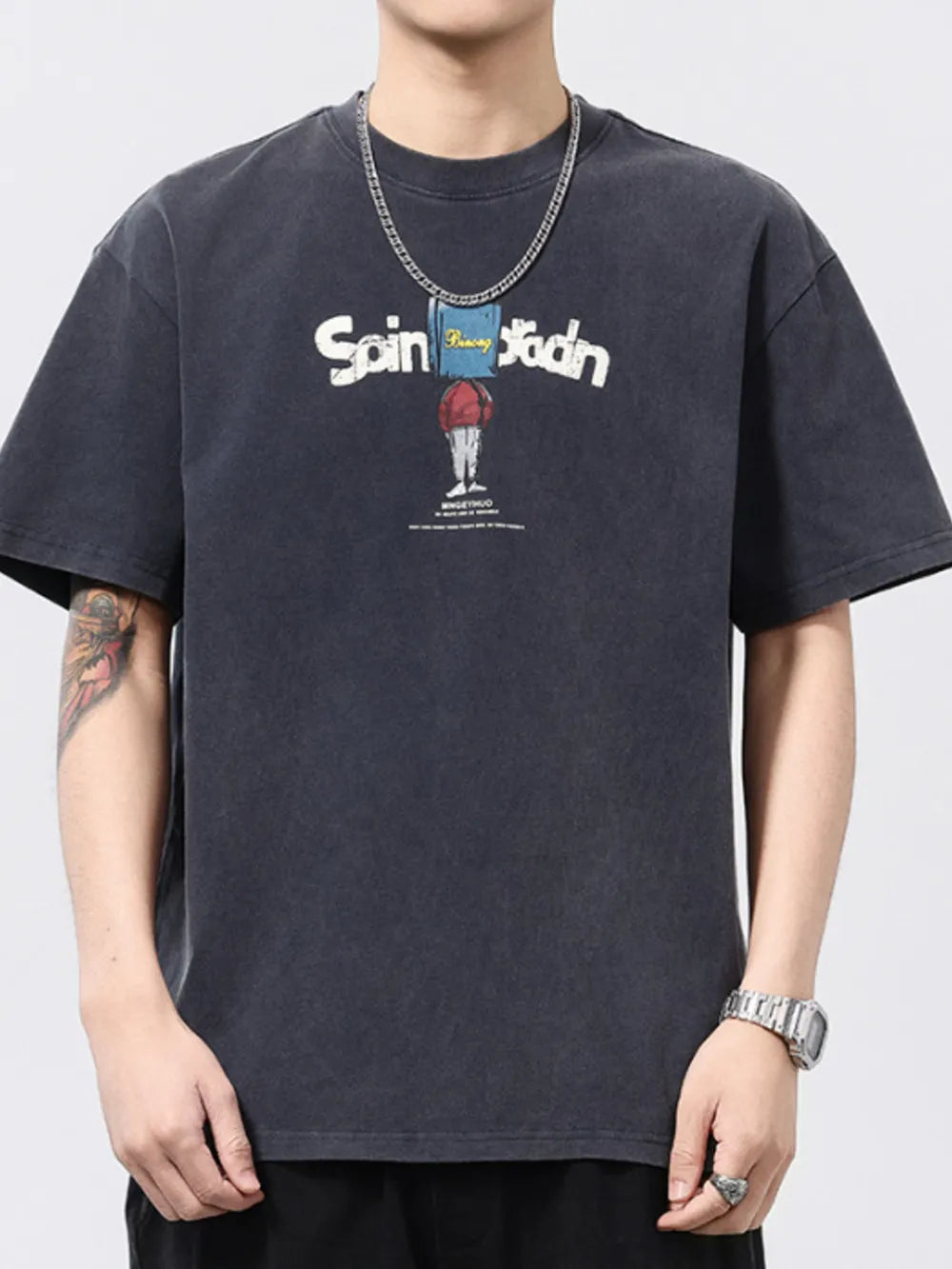 Men's relaxed fit graphic t-shirt in dark gray cotton with a front print.