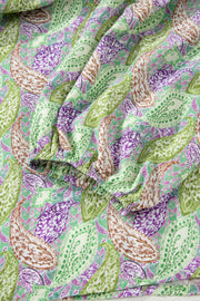 Paisley print puff sleeve blouse with elastic cuff in green, purple, and cream.