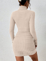 Ribbed turtleneck bodycon mini dress in apricot with long sleeves and a form-fitting silhouette.