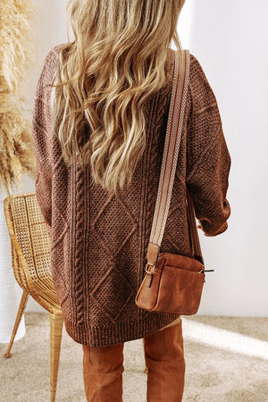 Cable knit diamond sweater dress in brown with a crossbody bag and suede boots.