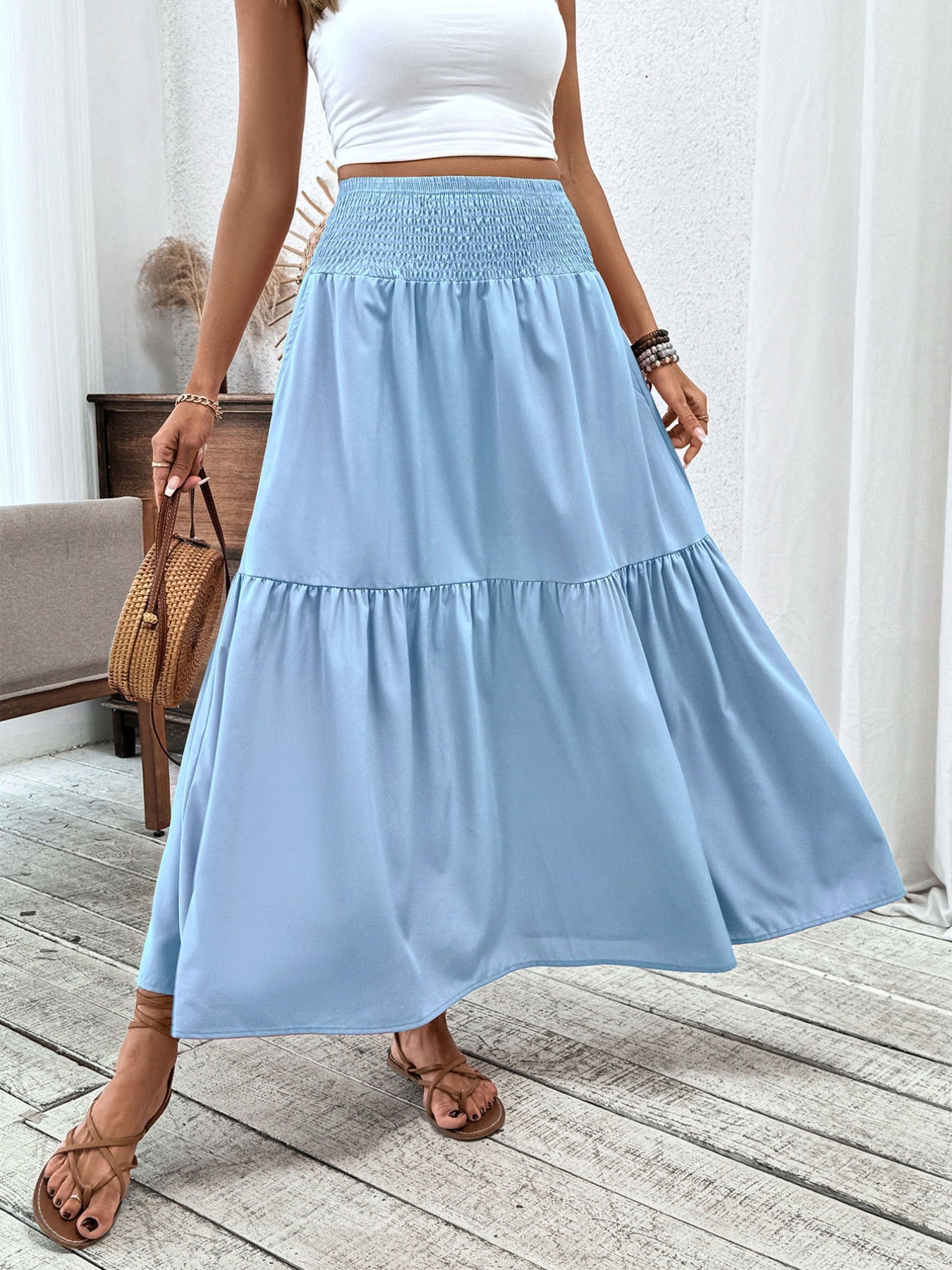 Light blue ruffled smocked waist maxi skirt with tiered hem