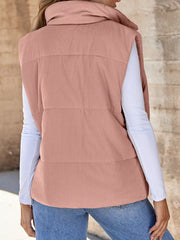 Pink corduroy zip-up vest coat with a high collar and ribbed texture.