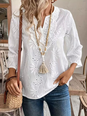 white blouse with eyelet and v-neck