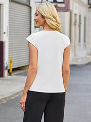 White V-neck shirt with short sleeves, styled with black pants.