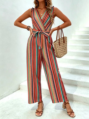 Striped wide-leg jumpsuit with tie waist, V-neck, sleeveless, red and orange bohemian print.