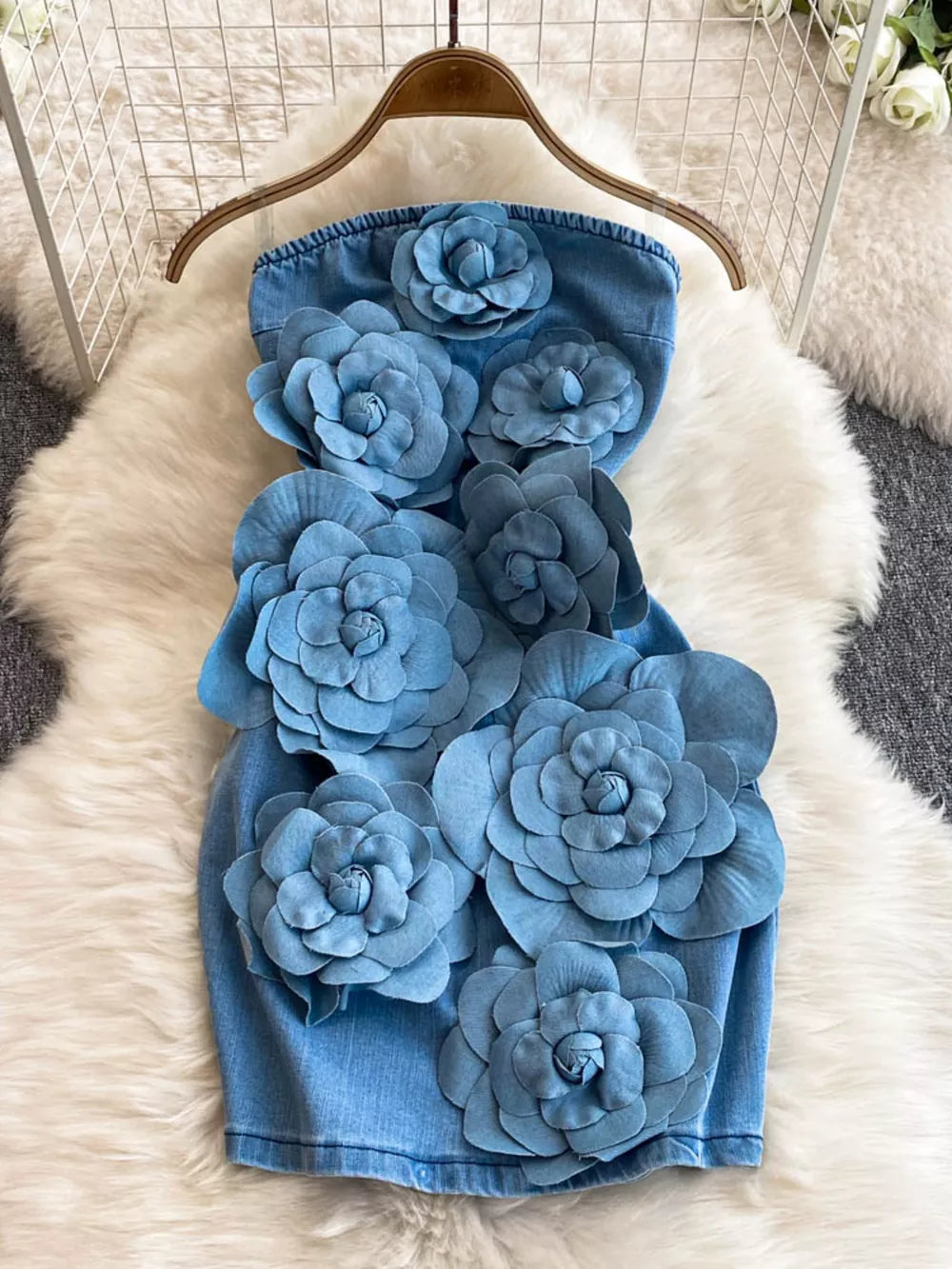 Blue denim strapless bodycon dress with 3D floral embellishments