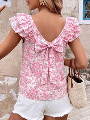 Floral ruffle sleeve maternity shirt with pink floral print and back bow detail.