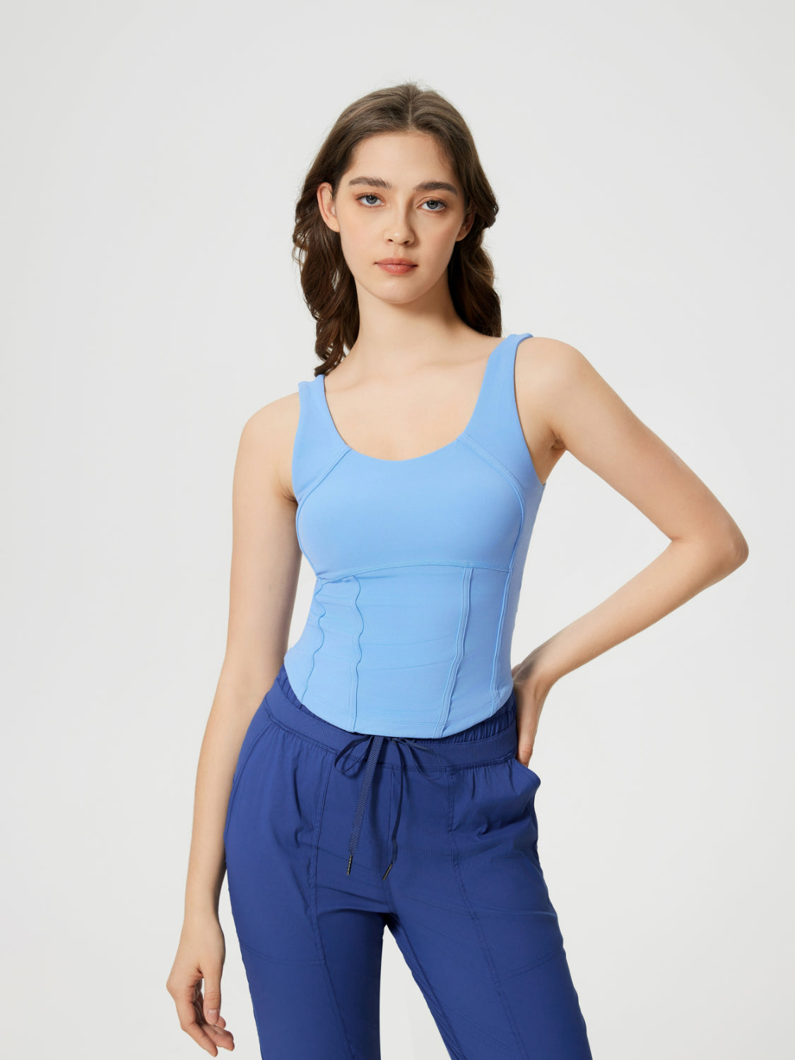 Light blue sculpted seam tank top with built-in support and scoop neckline.