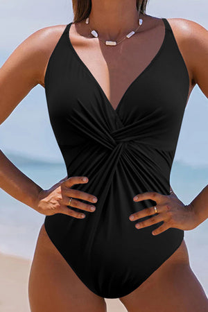Black twisted front plunge swimsuit with deep V-neckline and high-cut legs.