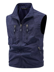 Dark blue men's multi-pocket outdoor vest with zip closure and zippered chest pockets.