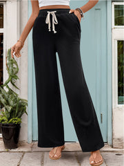 Black relaxed palazzo trousers with drawstring waist and wide legs