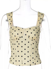 Pastel yellow polka dot sweetheart neckline tank top with lace trim.
