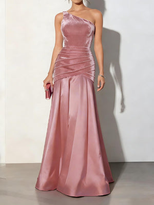 Dusty pink velvet one-shoulder maxi dress with ruched detail and satin skirt.