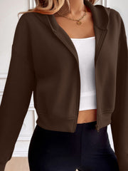 Chocolate cropped hooded zip-up sweatshirt with a relaxed fit and ribbed hem.