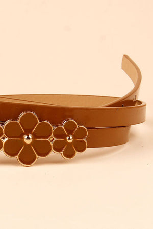 Caramel skinny belt with gold-tone flower embellishments.