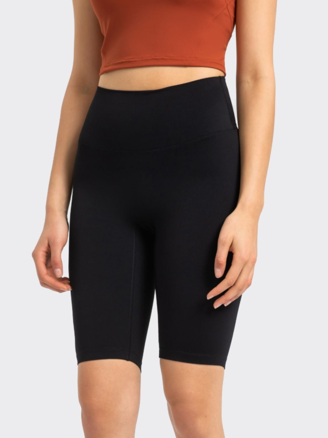 Black active bike shorts with a high waist and a smooth finish.