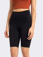 Black active bike shorts with a high waist and a smooth finish.