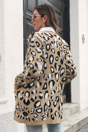 Leopard knit longline cardigan with pockets, acrylic material.
