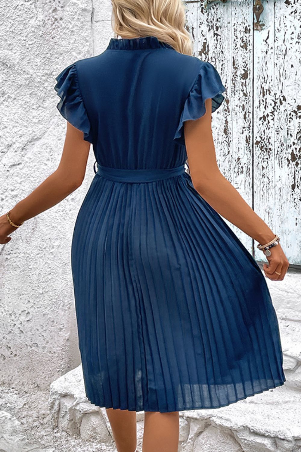 Deep Teal ruffled sleeve pleated midi dress with a belted waist.