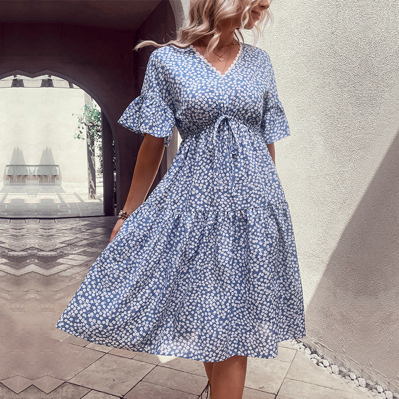Light blue ditsy floral tiered midi dress with v-neck and tie waist