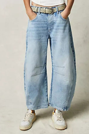 Light blue denim barrel leg jeans with button fly and knee detail