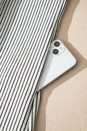 Chic striped ruffle maxi dress with button-down detail and cap sleeves.